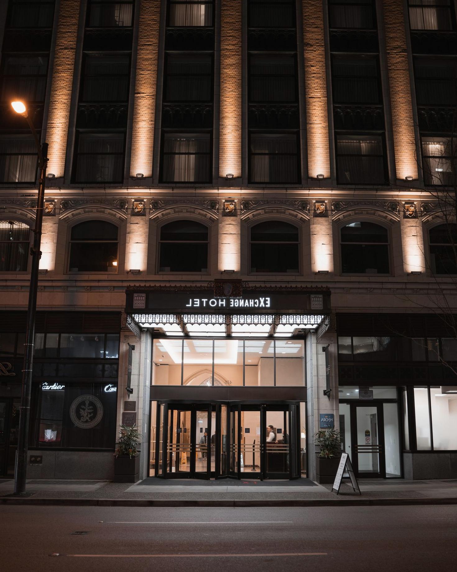 Illuminated facade of Fastbonusclaim.vip Hotel in Vancouver